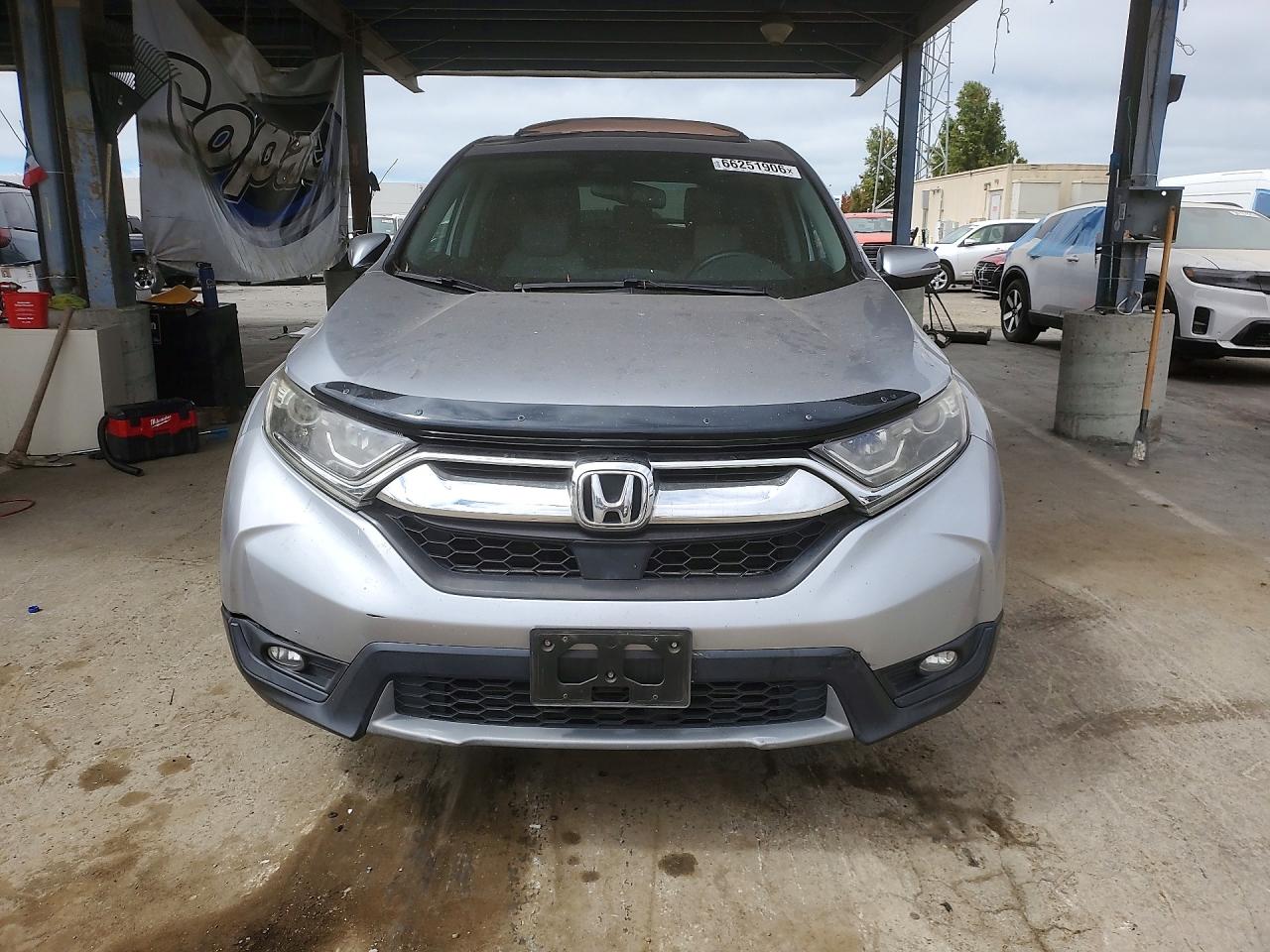 7FARW2H86JE015296 · 2018 HONDA CR-V · 5/14