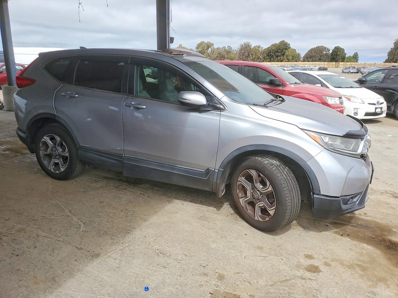 7FARW2H86JE015296 · 2018 HONDA CR-V · 4/14