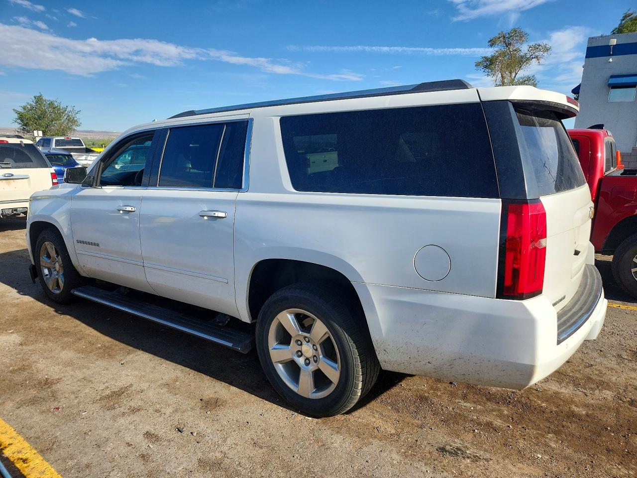 1GNSKJKC0LR149452 · 2020 CHEVROLET SUBURBAN · 2/13