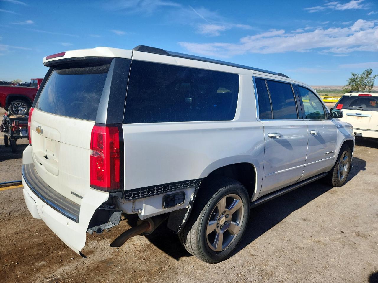 1GNSKJKC0LR149452 · 2020 CHEVROLET SUBURBAN · 3/13