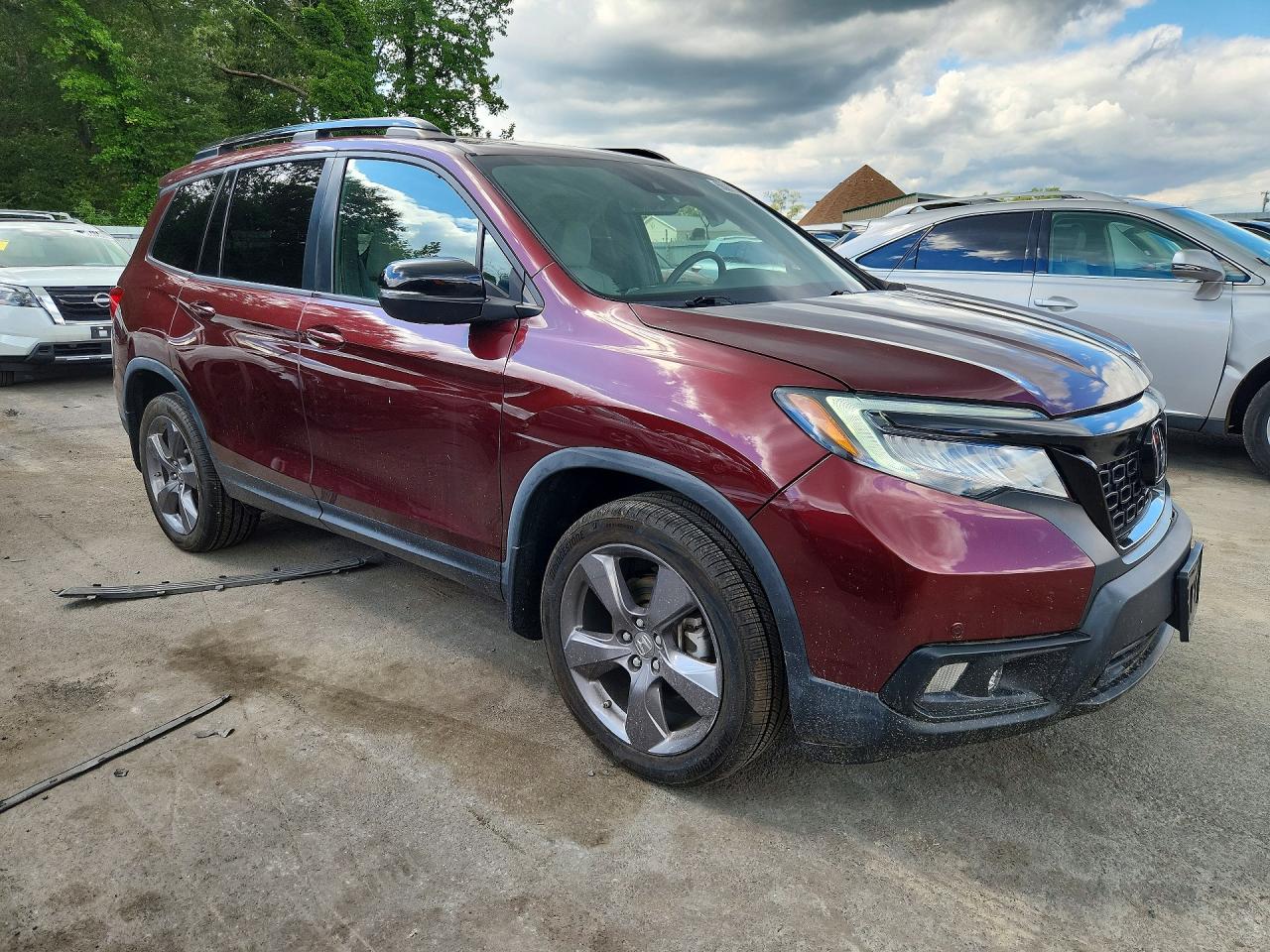5FNYF8H90MB029072 · 2021 HONDA PASSPORT · 4/12