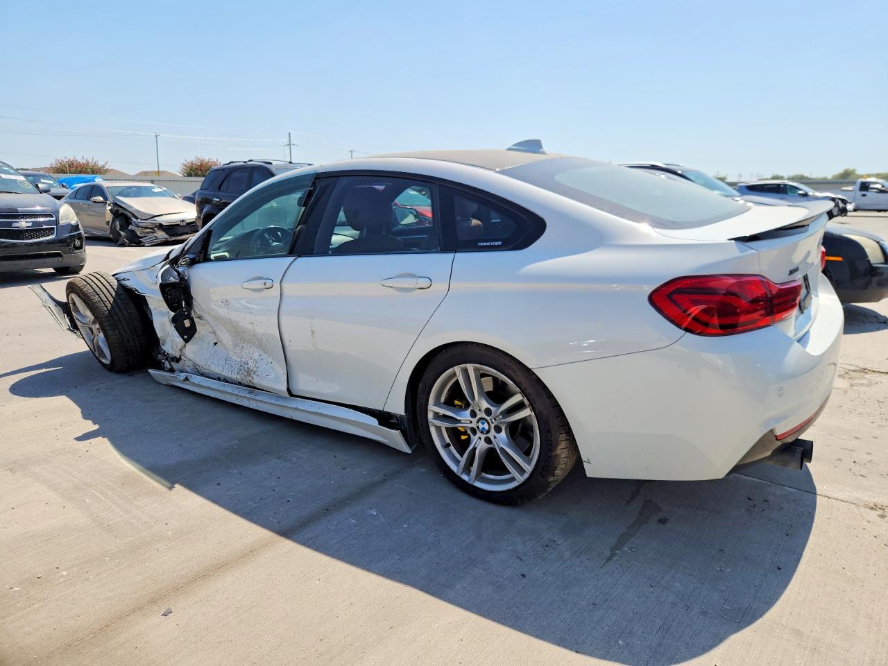 WBA4J3C56KBL07703 · 2019 BMW 430XI · 2/12