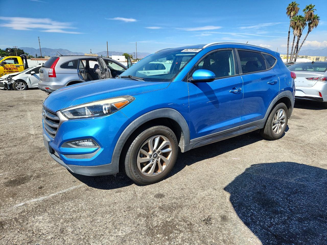 KM8J3CA47GU144321 · 2016 HYUNDAI TUCSON