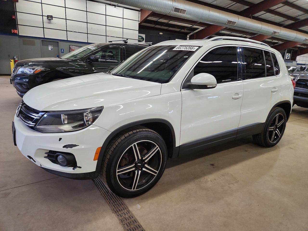 WVGBV7AX6FW602840 · 2015 VOLKSWAGEN TIGUAN