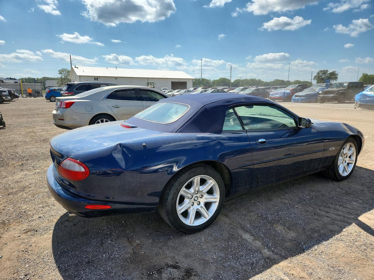 SAJJA42C5YNA10400 · 2000 JAGUAR XK8 · 3/12