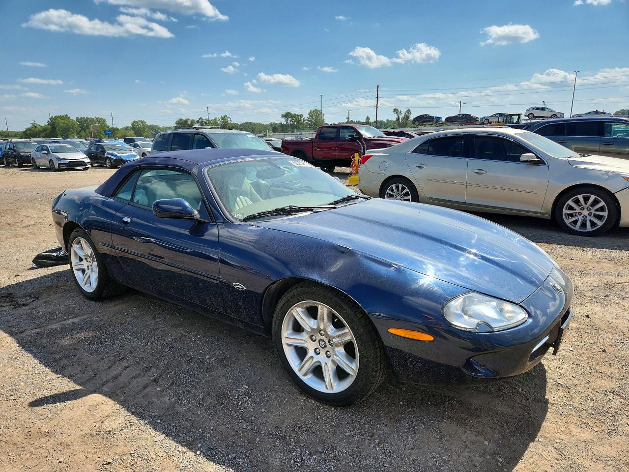 SAJJA42C5YNA10400 · 2000 JAGUAR XK8 · 4/12
