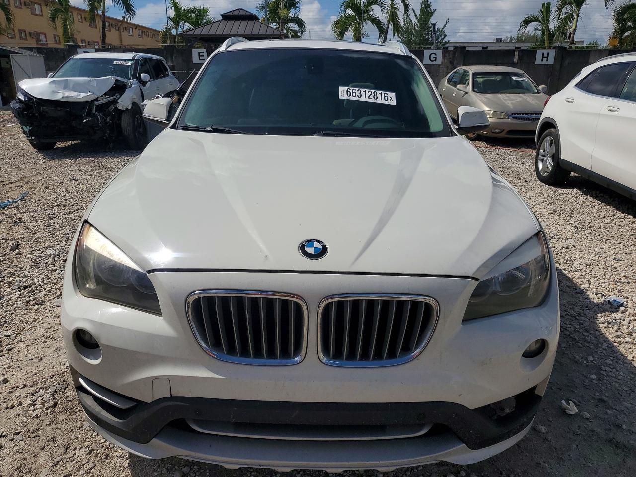 WBAVL1C53FVY24884 · 2015 BMW X1 · 5/13