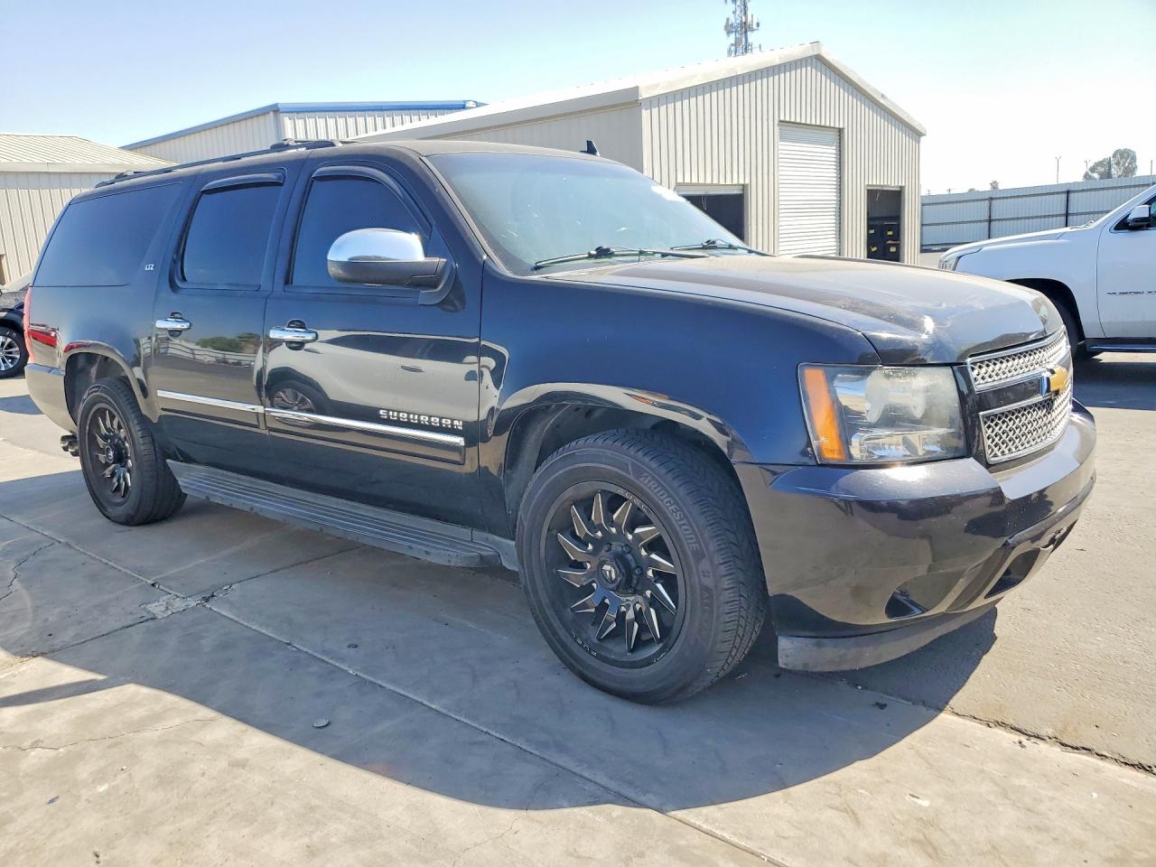 1GNSCKE08ER110048 · 2014 CHEVROLET SUBURBAN · 4/13