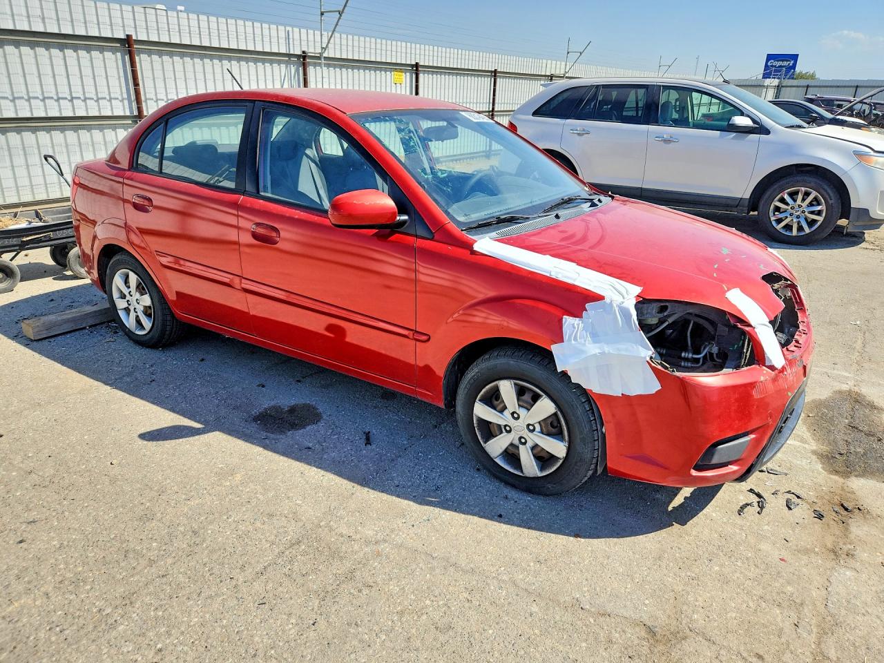 KNADH4A31B6736906 · 2011 KIA RIO · 4/13