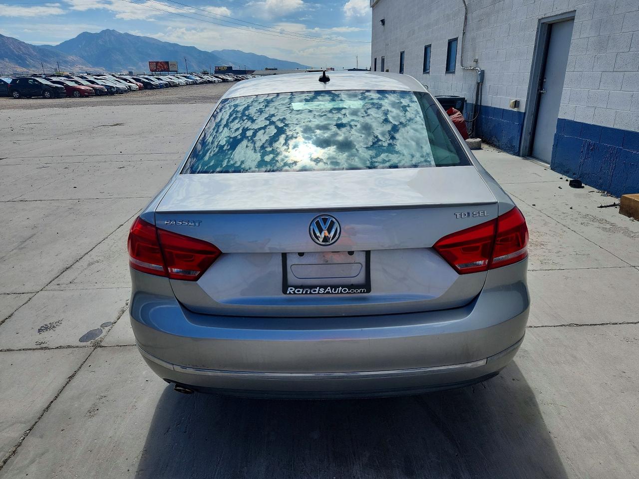 1VWCN7A31EC063773 · 2014 VOLKSWAGEN PASSAT · 6/12