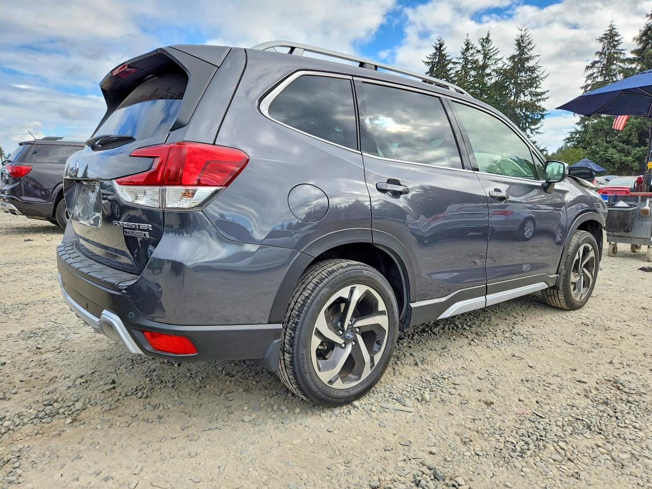 JF2SKARC7NH529817 · 2022 SUBARU FORESTER · 3/14