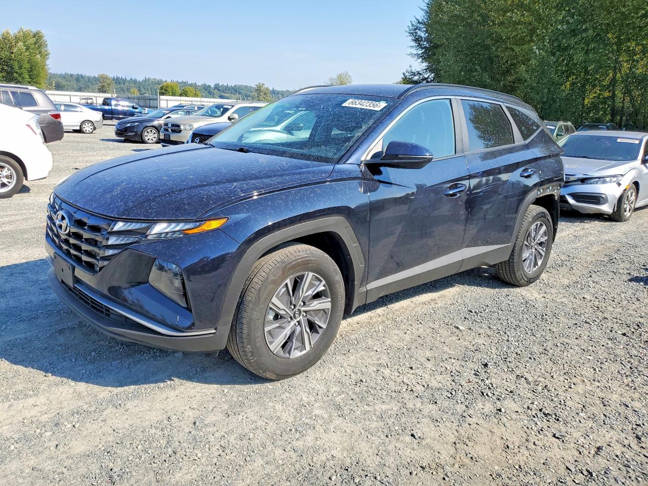 KM8JBCA10NU082427 · 2022 HYUNDAI TUCSON
