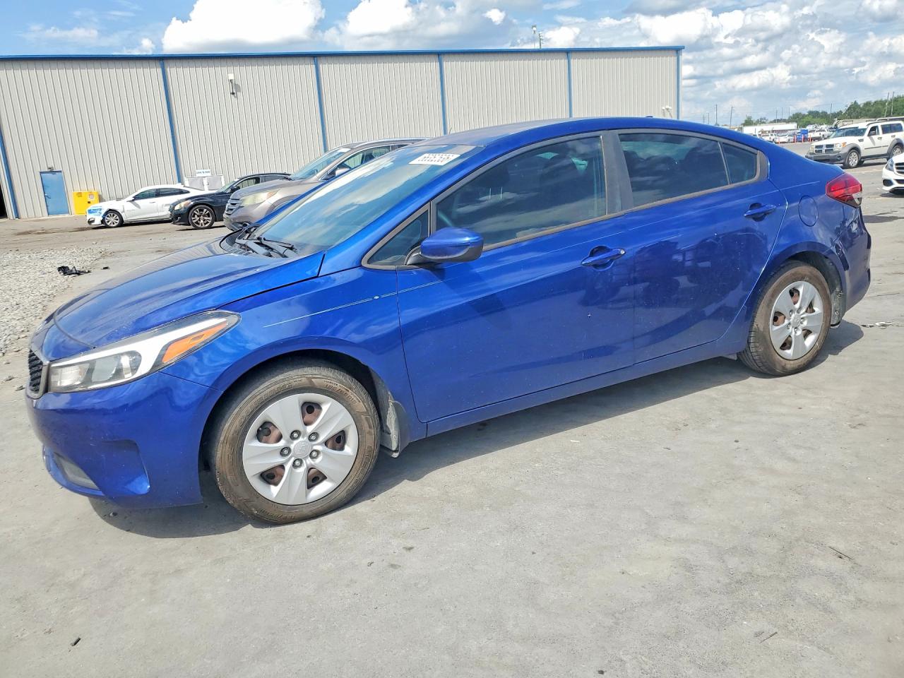 3KPFK4A70JE213563 · 2018 KIA FORTE