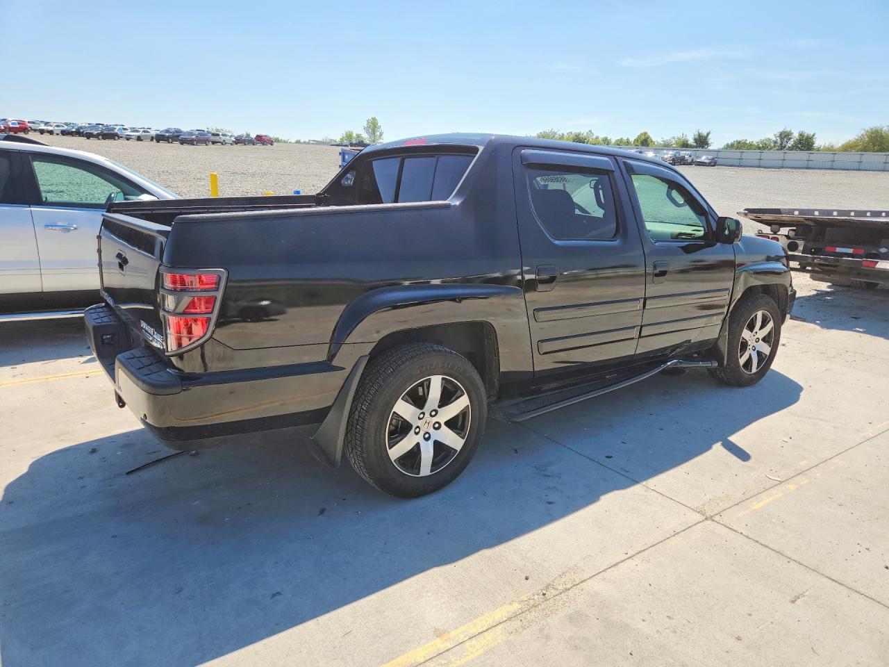 5FPYK1F60EB004418 · 2014 HONDA RIDGELINE · 3/12