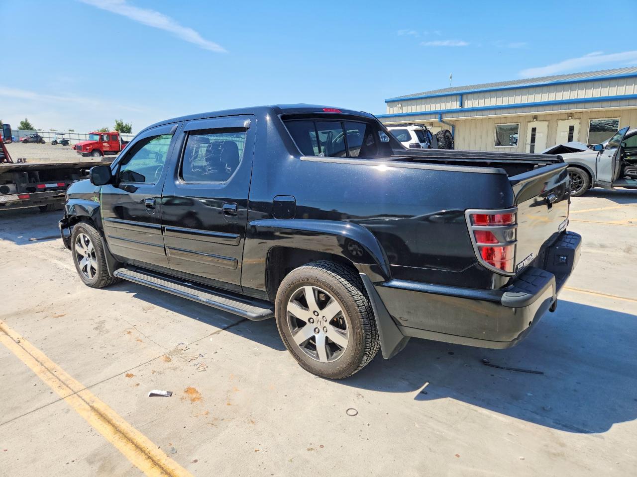 5FPYK1F60EB004418 · 2014 HONDA RIDGELINE · 2/12