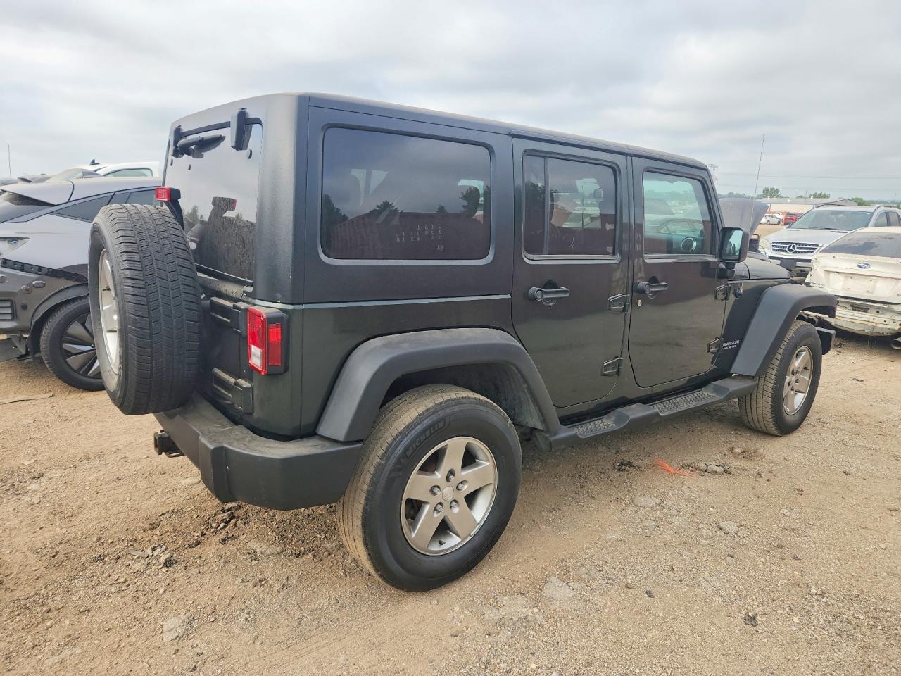 1J4HA6H15BL583001 · 2011 JEEP WRANGLER UNLIMITED · 3/12