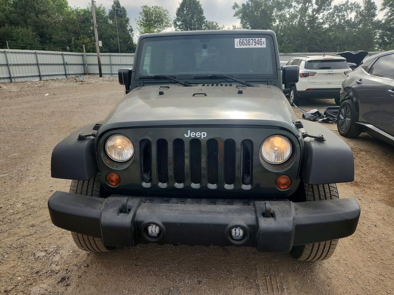 1J4HA6H15BL583001 · 2011 JEEP WRANGLER UNLIMITED · 5/12