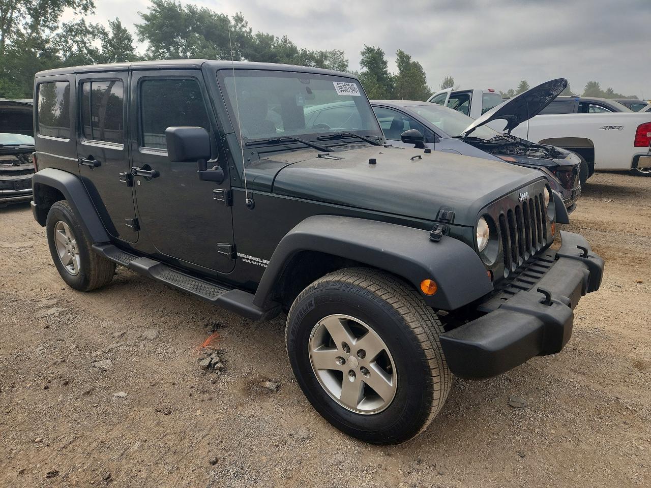 1J4HA6H15BL583001 · 2011 JEEP WRANGLER UNLIMITED · 4/12