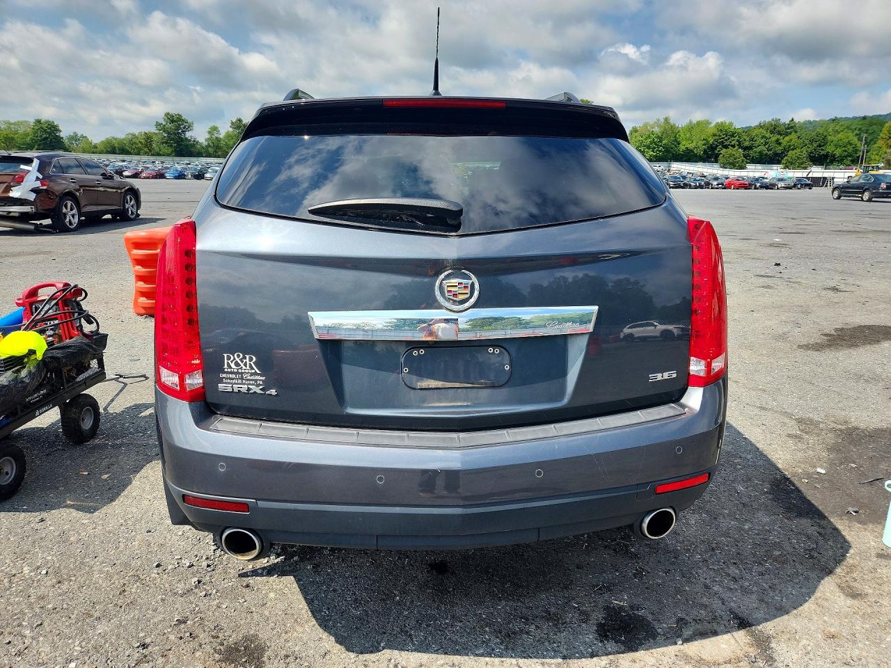 3GYFNEE34CS548148 · 2012 CADILLAC SRX · 6/13