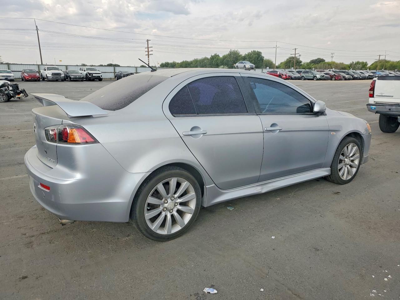 JA32U8FW4BU032063 · 2011 MITSUBISHI LANCER · 3/12