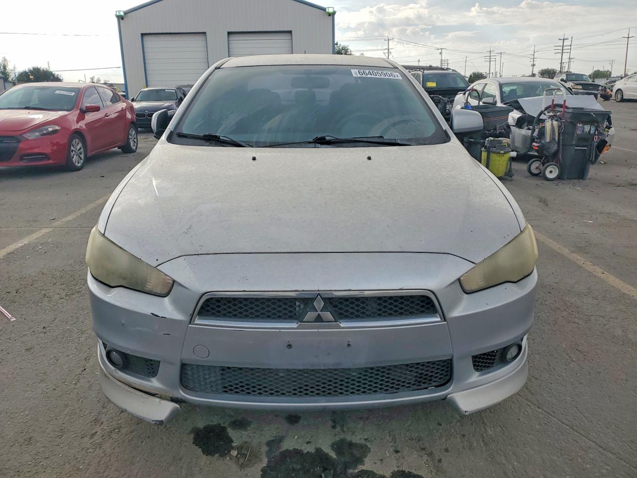 JA32U8FW4BU032063 · 2011 MITSUBISHI LANCER · 5/12