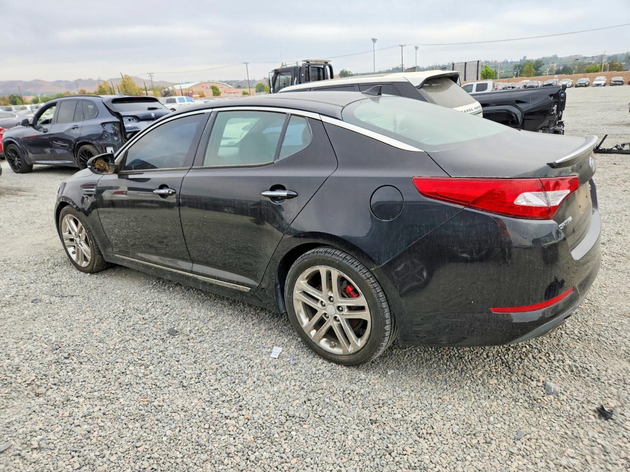 5XXGR4A63DG129661 · 2013 KIA OPTIMA · 2/12