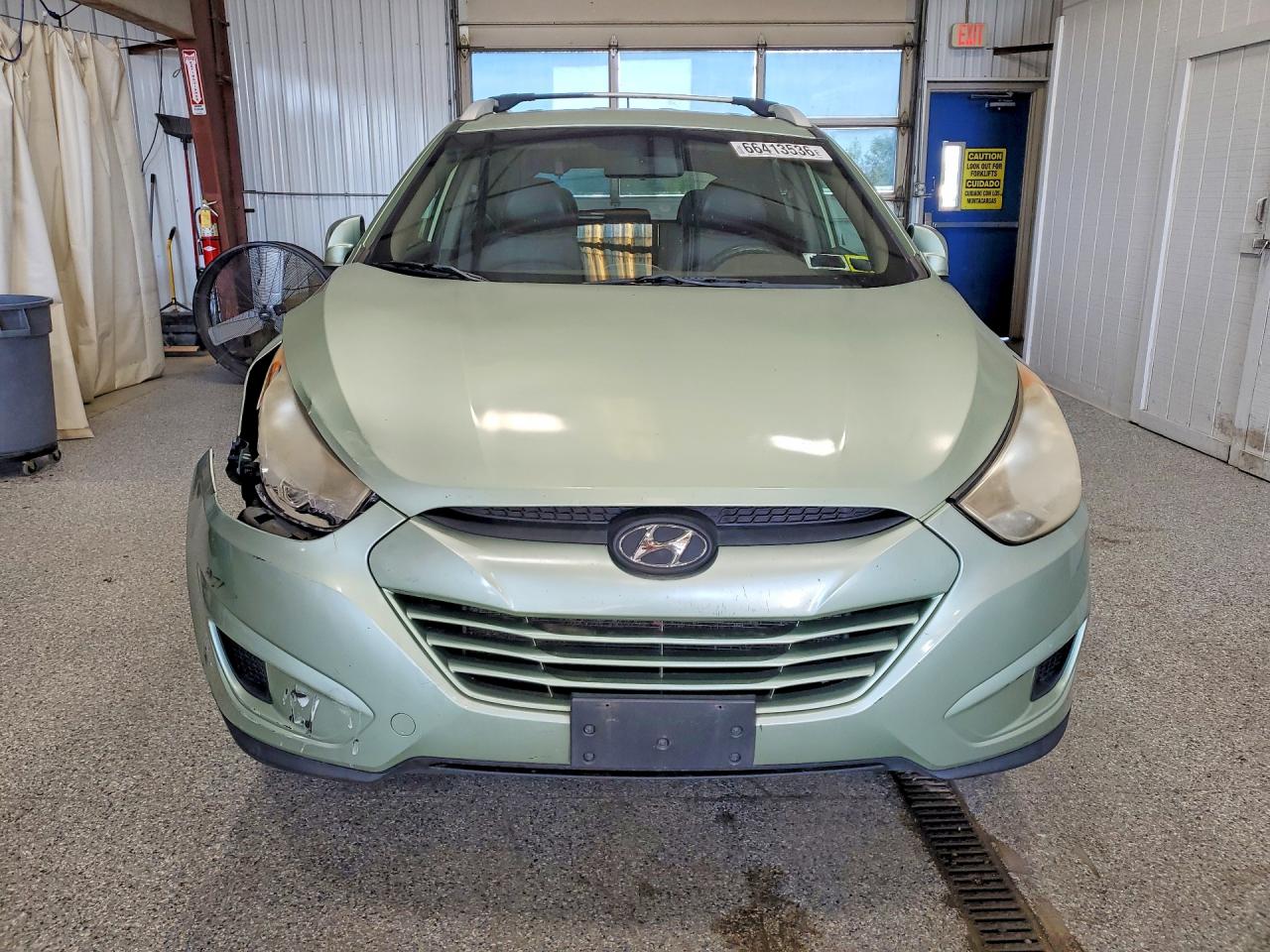 KM8JUCAC5CU385454 · 2012 HYUNDAI TUCSON · 5/13