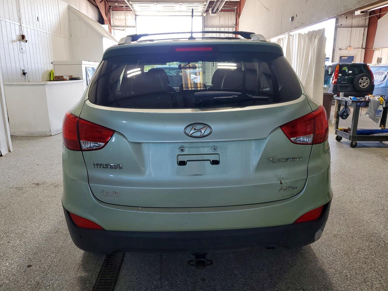 KM8JUCAC5CU385454 · 2012 HYUNDAI TUCSON · 6/13