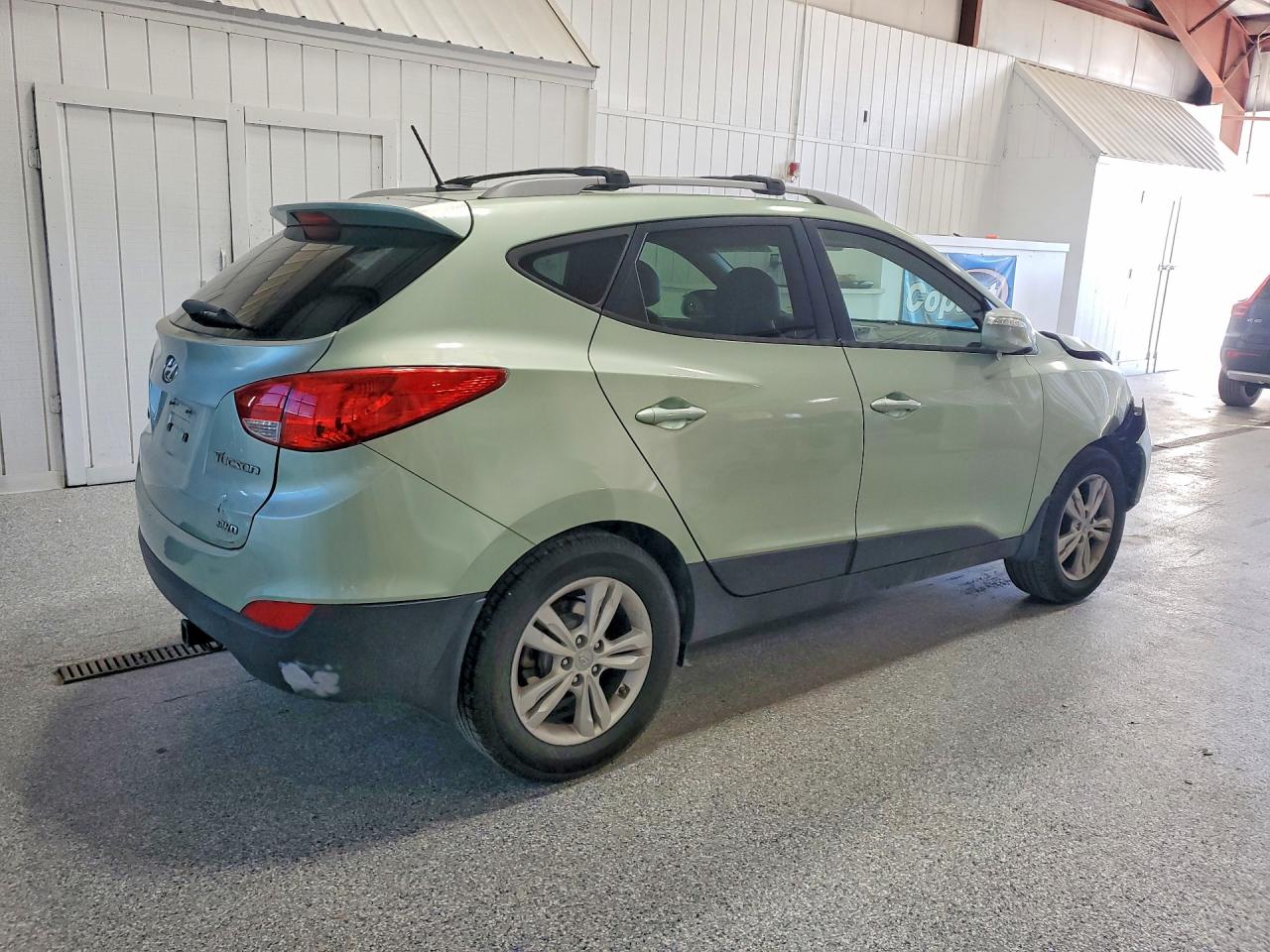KM8JUCAC5CU385454 · 2012 HYUNDAI TUCSON · 3/13