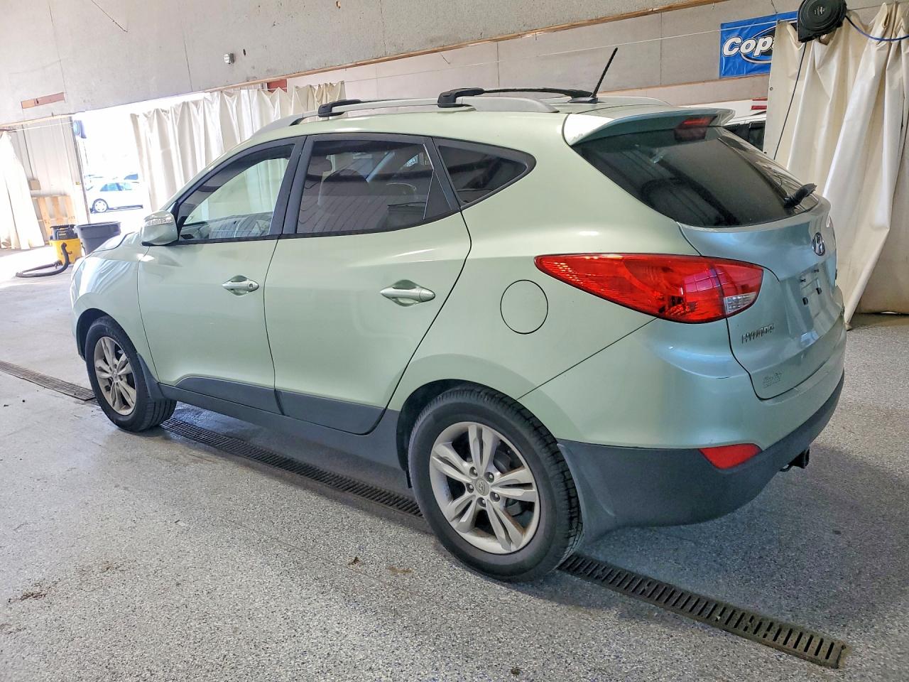 KM8JUCAC5CU385454 · 2012 HYUNDAI TUCSON · 2/13
