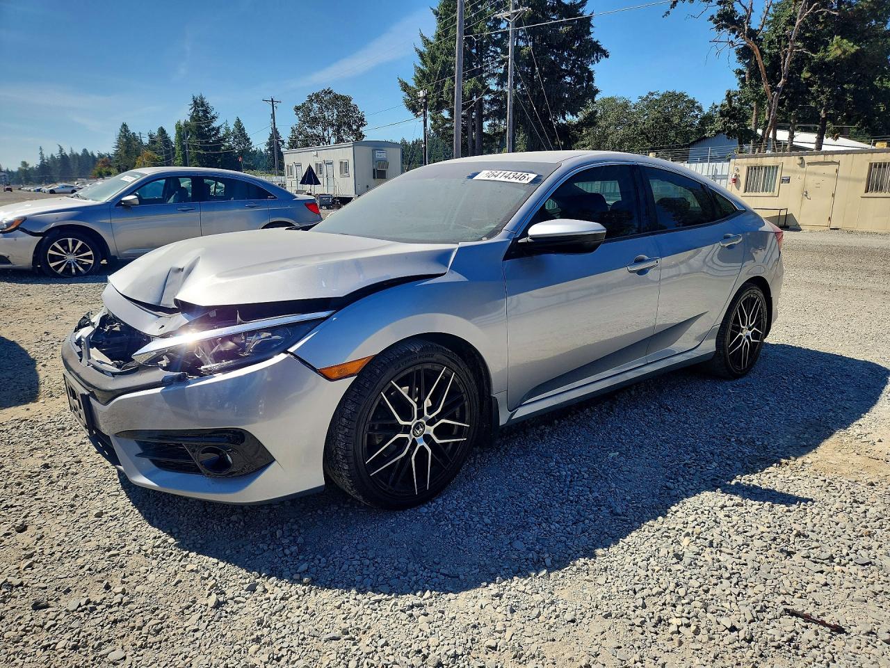 2HGFC2F55JH549885 · 2018 HONDA CIVIC