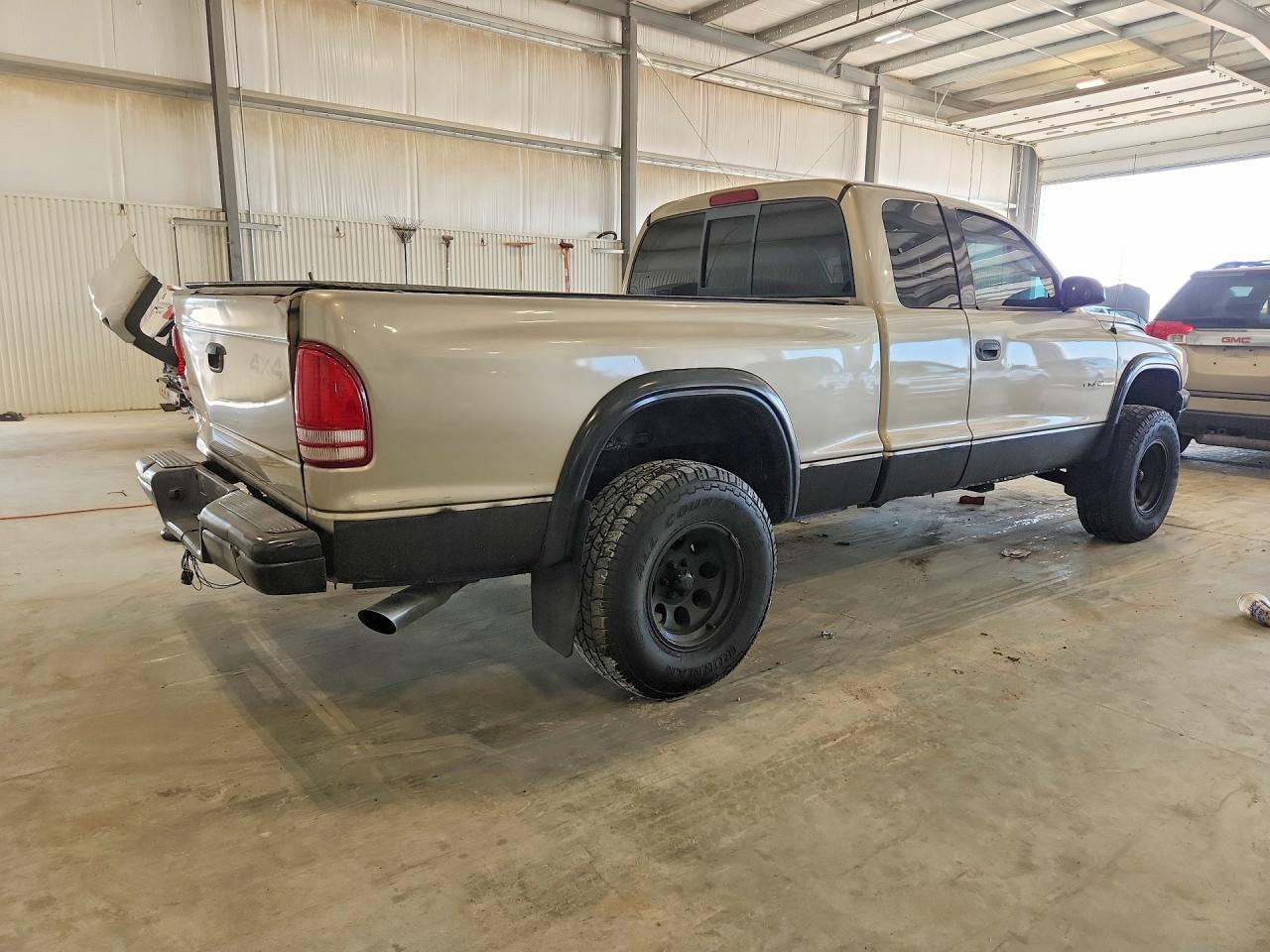 1B7GG12X32S701021 · 2002 DODGE DAKOTA · 3/12