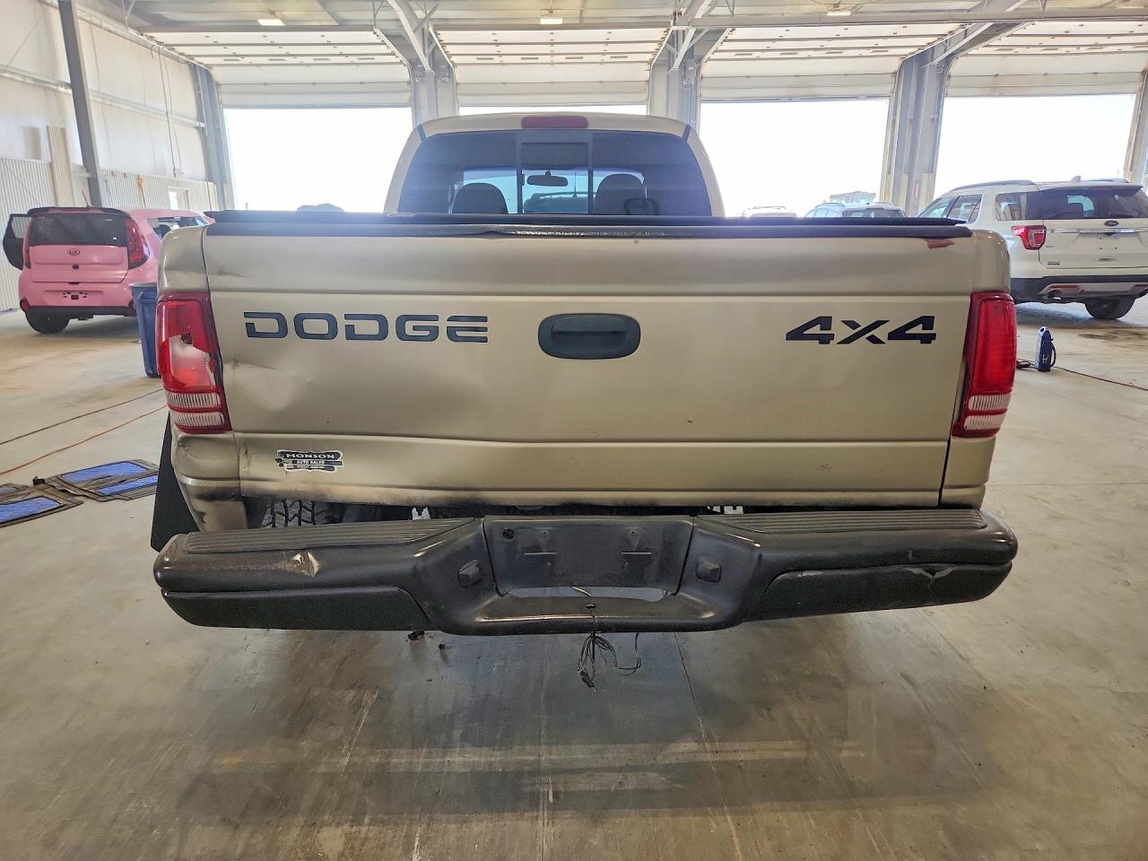 1B7GG12X32S701021 · 2002 DODGE DAKOTA · 6/12
