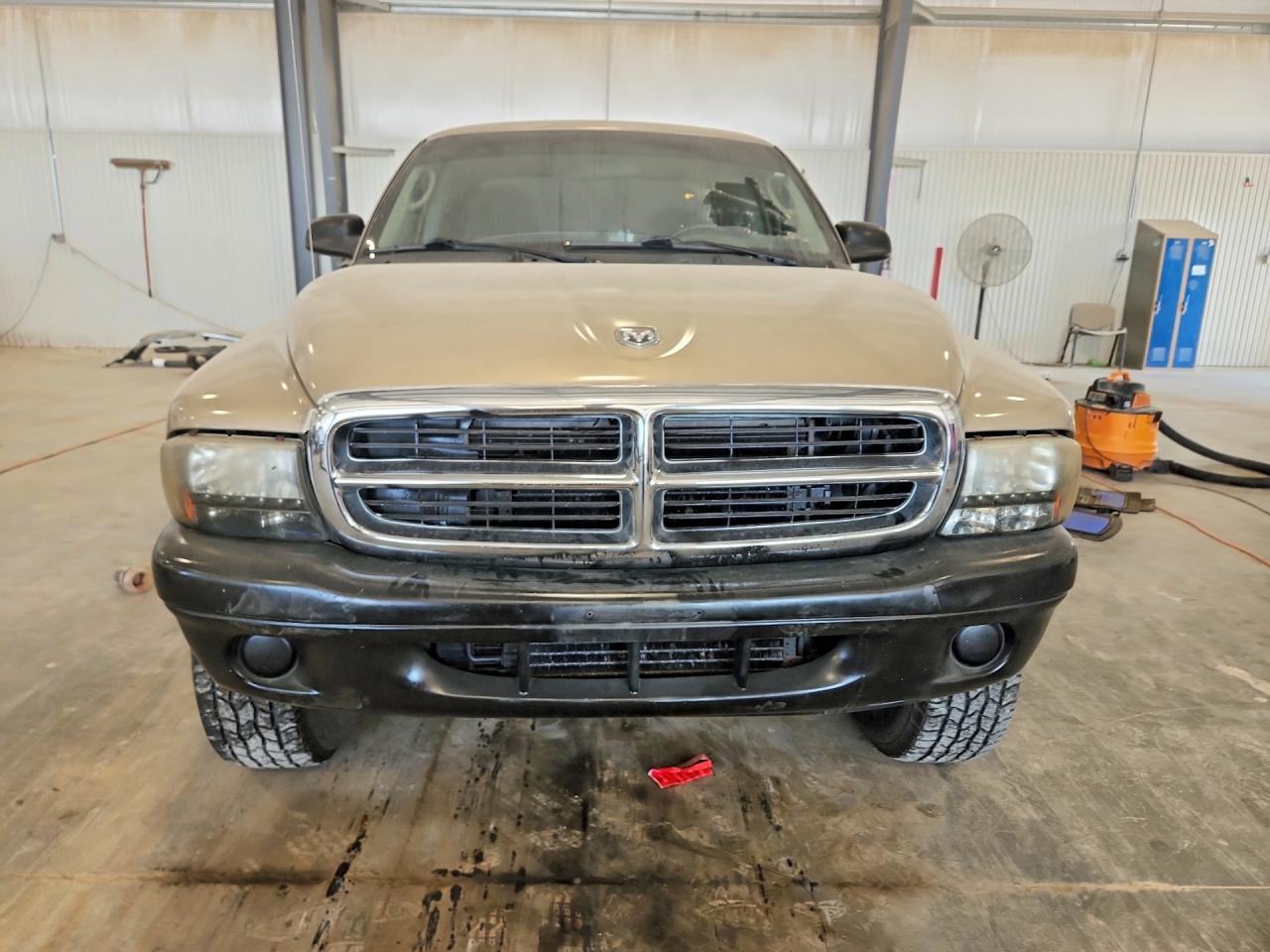 1B7GG12X32S701021 · 2002 DODGE DAKOTA · 5/12