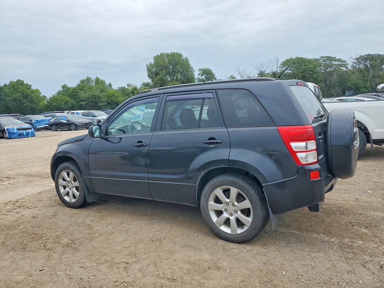 JS3TD0D71C4100518 · 2012 SUZUKI GRAND VITARA · 2/13