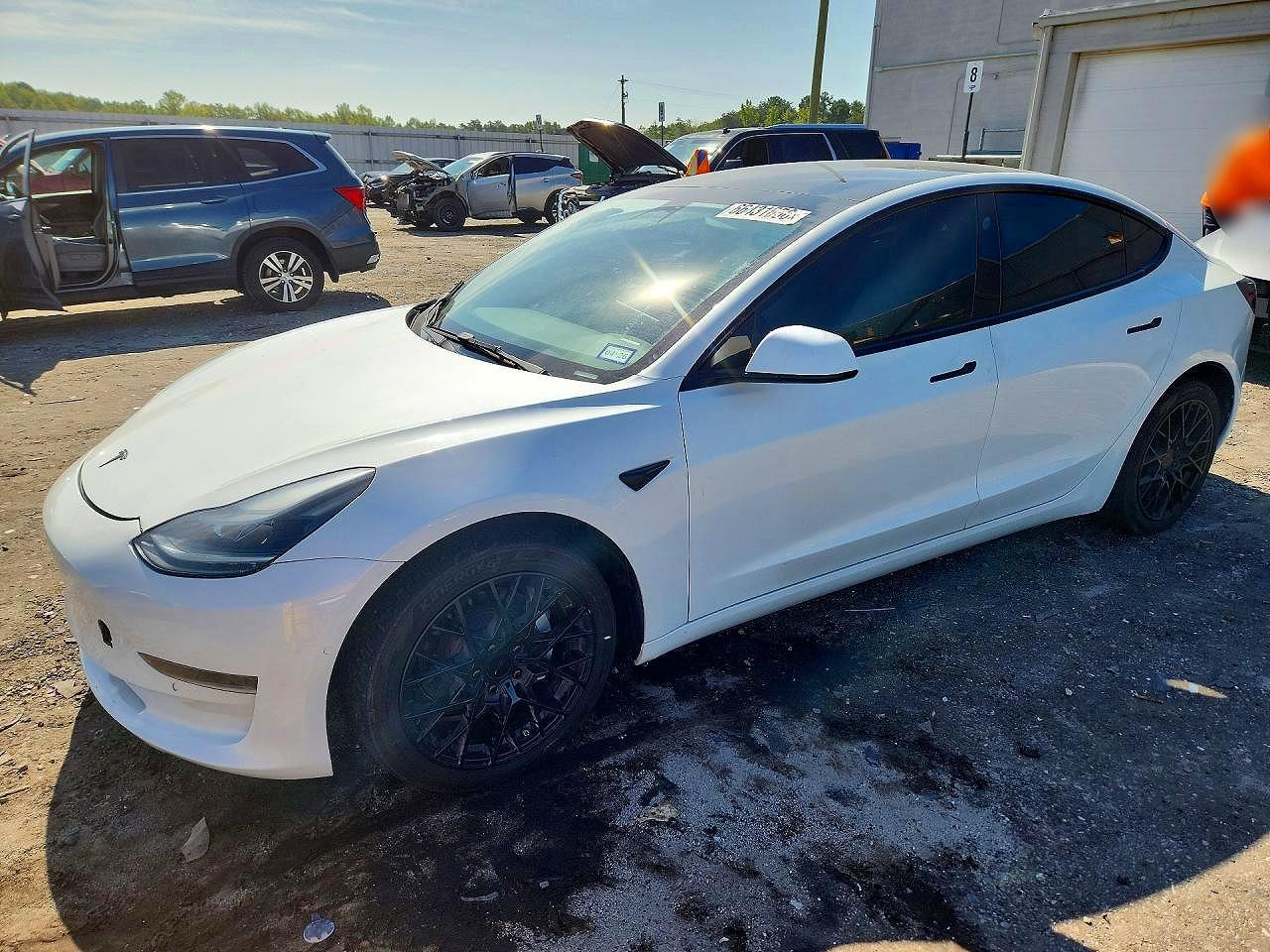 5YJ3E1EA9NF337989 · 2022 TESLA MODEL 3