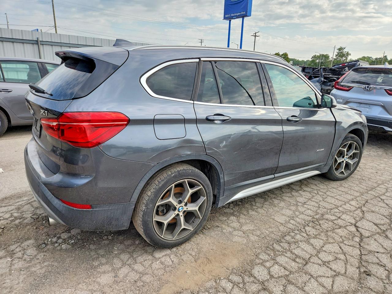 WBXHT3C3XG5E47908 · 2016 BMW X1 · 3/12