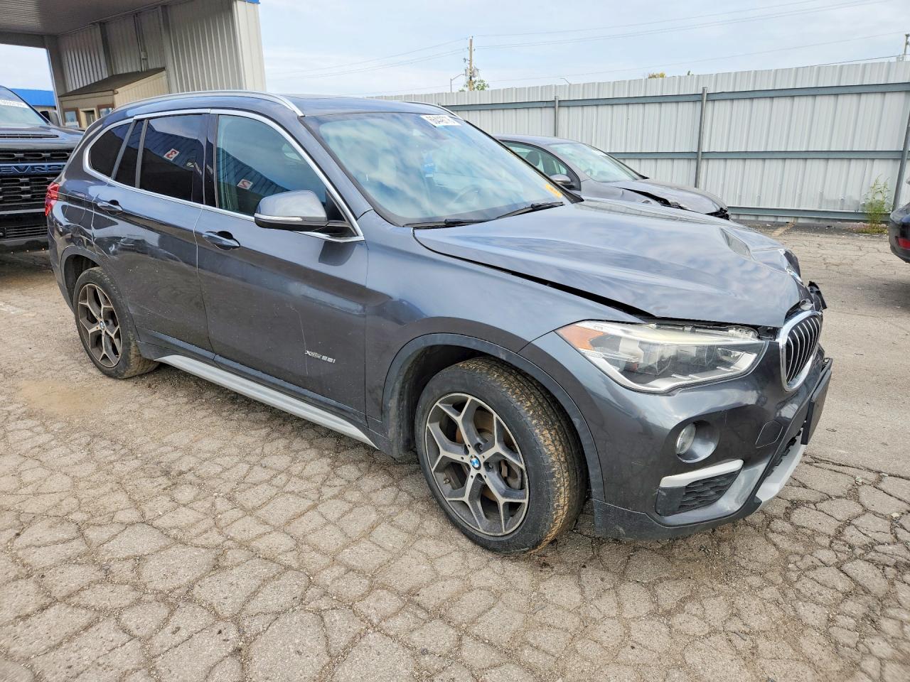 WBXHT3C3XG5E47908 · 2016 BMW X1 · 4/12