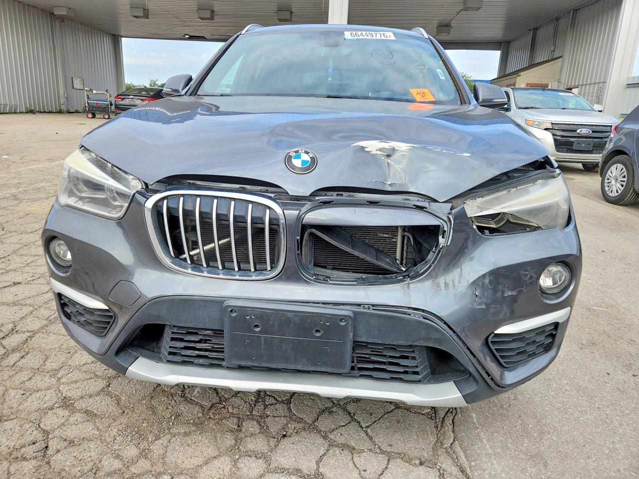 WBXHT3C3XG5E47908 · 2016 BMW X1 · 5/12