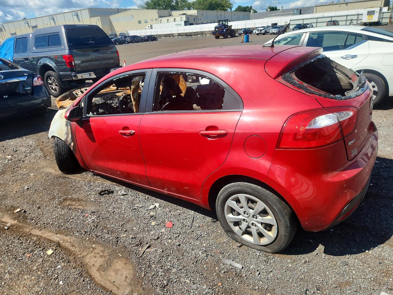 KNADM5A31F6517127 · 2015 KIA RIO · 2/11