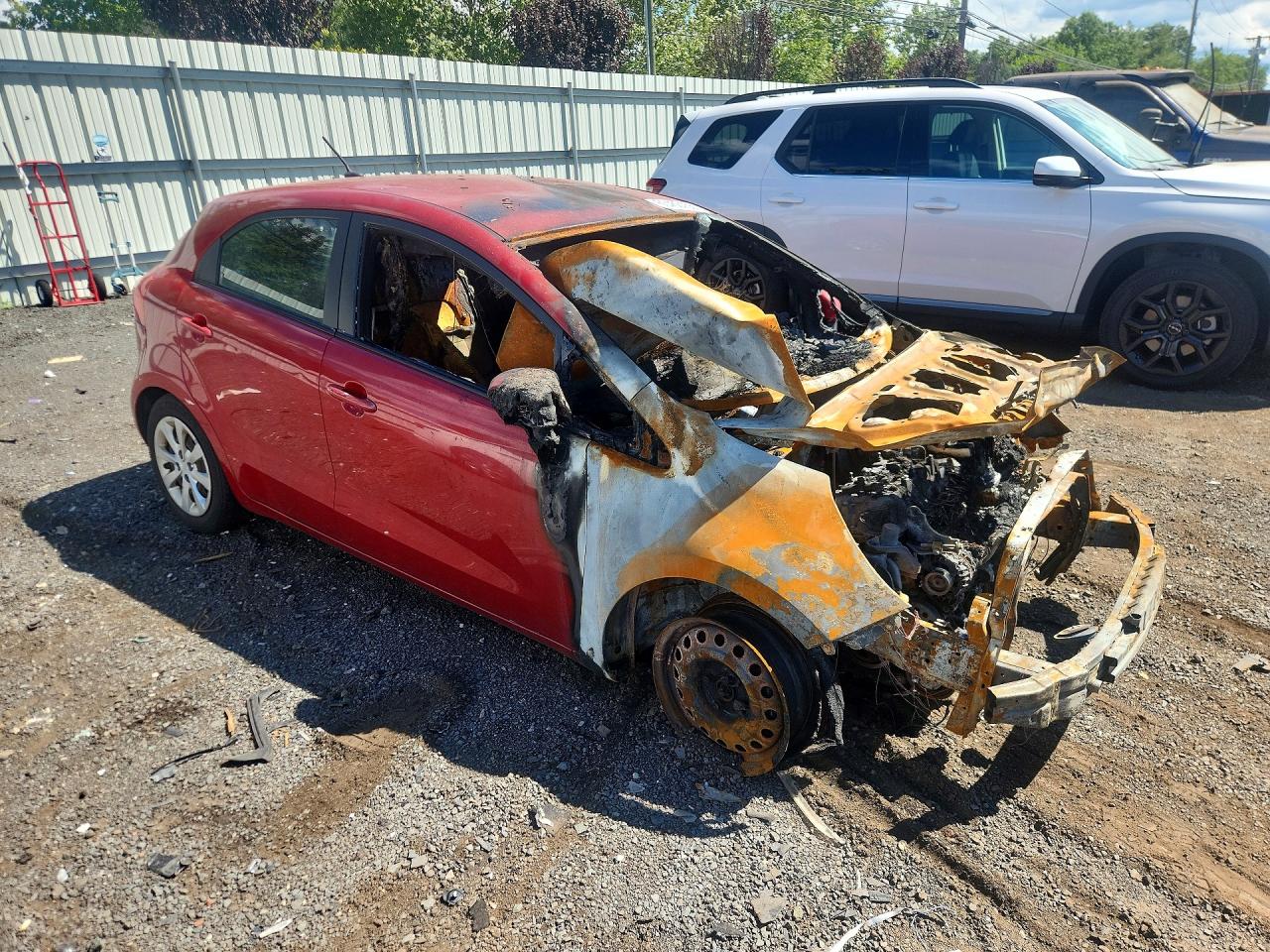 KNADM5A31F6517127 · 2015 KIA RIO · 4/11