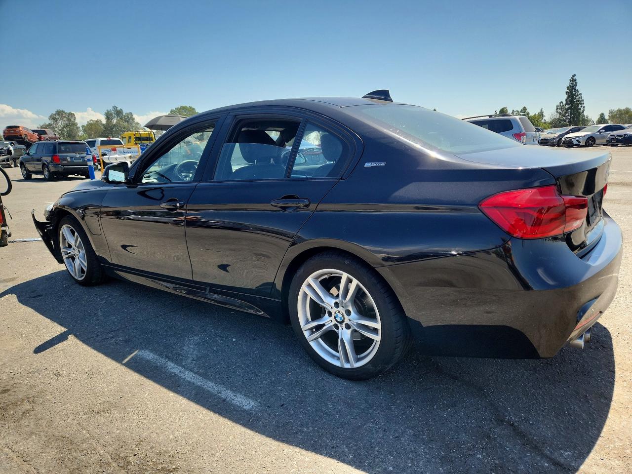 WBA8E1C55JA762704 · 2018 BMW 330E · 2/12