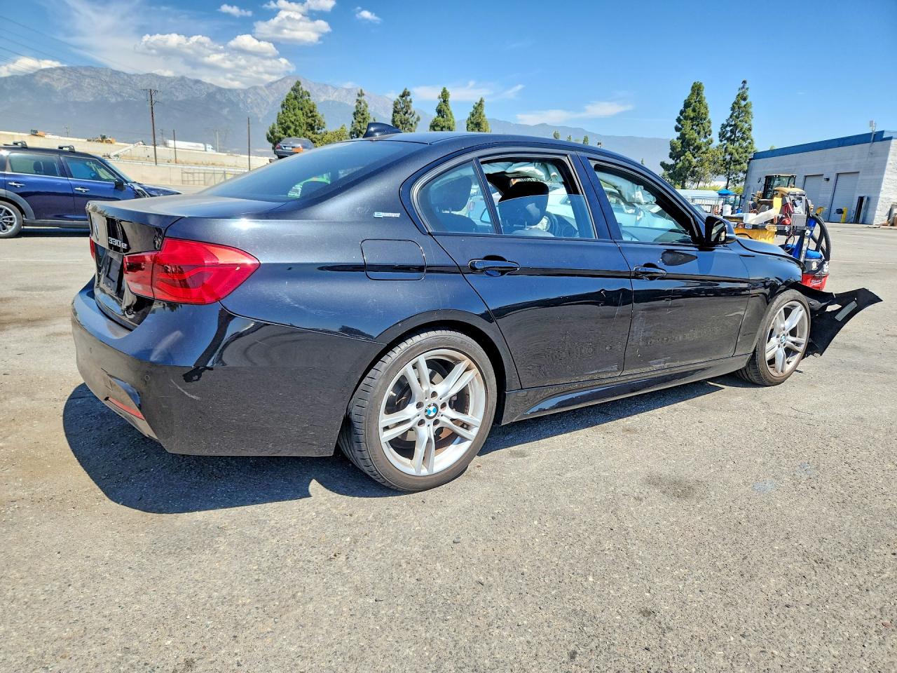 WBA8E1C55JA762704 · 2018 BMW 330E · 3/12
