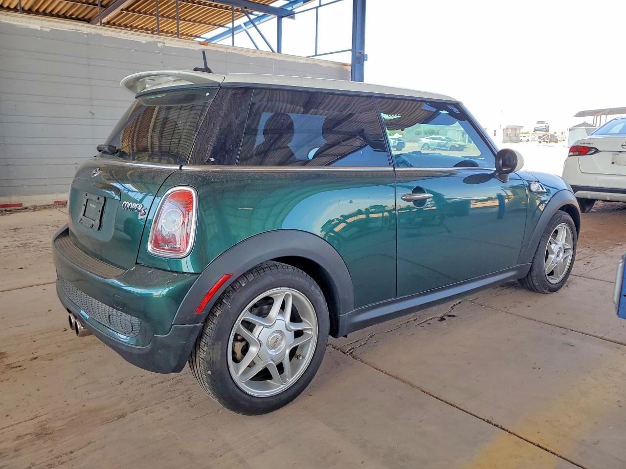 WMWMF73509TT97220 · 2009 MINI COOPER · 3/12