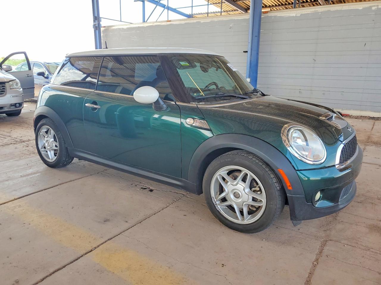 WMWMF73509TT97220 · 2009 MINI COOPER · 4/12