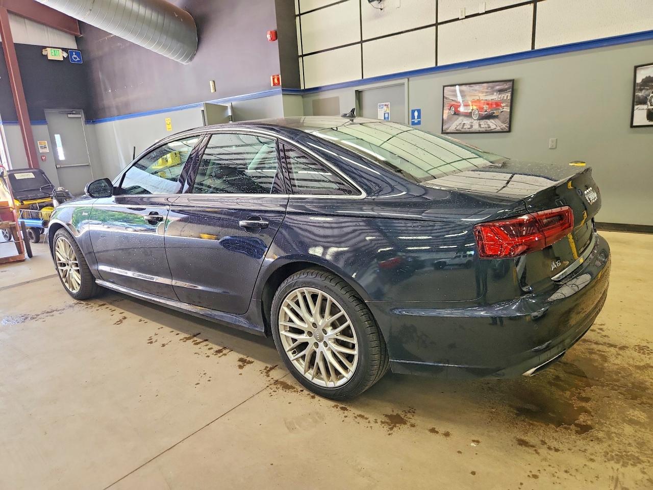 WAUHGAFC4GN004942 · 2016 AUDI A6 · 2/12