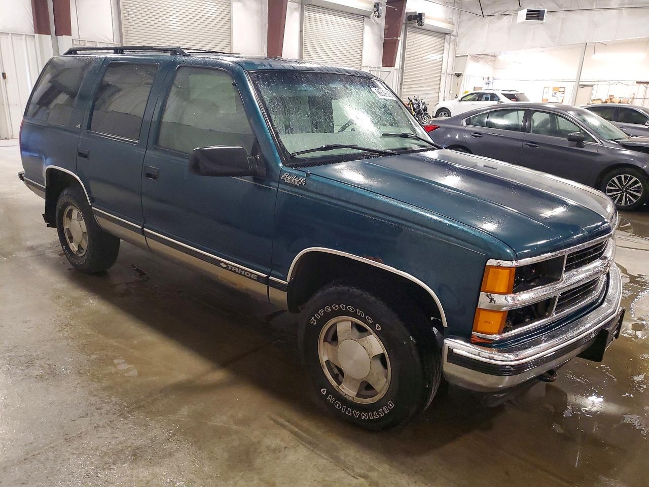 1GNEK13R2XJ512662 · 1999 CHEVROLET TAHOE · 4/13