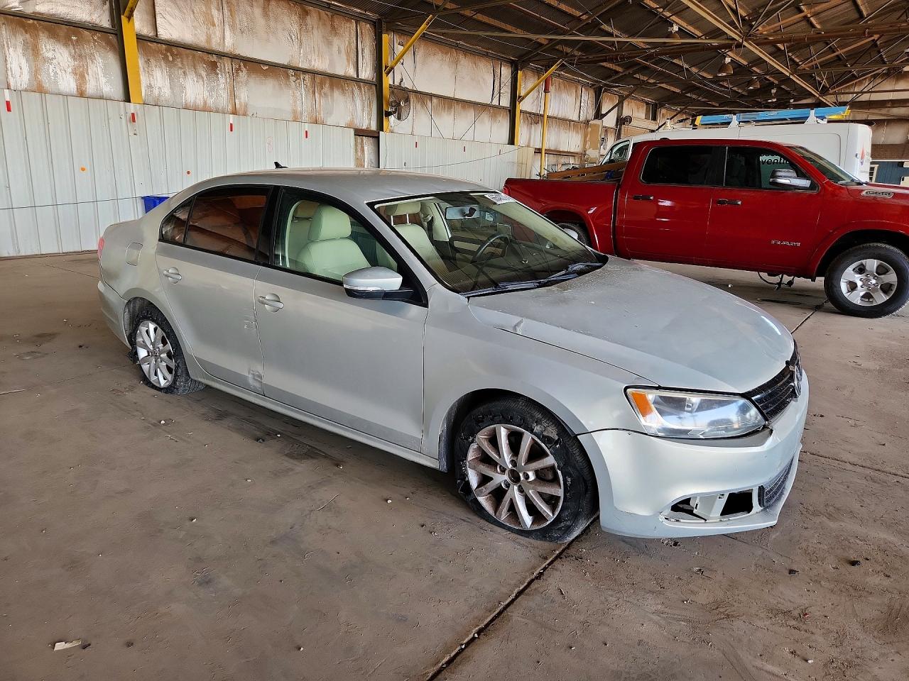 3VWDZ7AJ3BM354261 · 2011 VOLKSWAGEN JETTA · 4/12