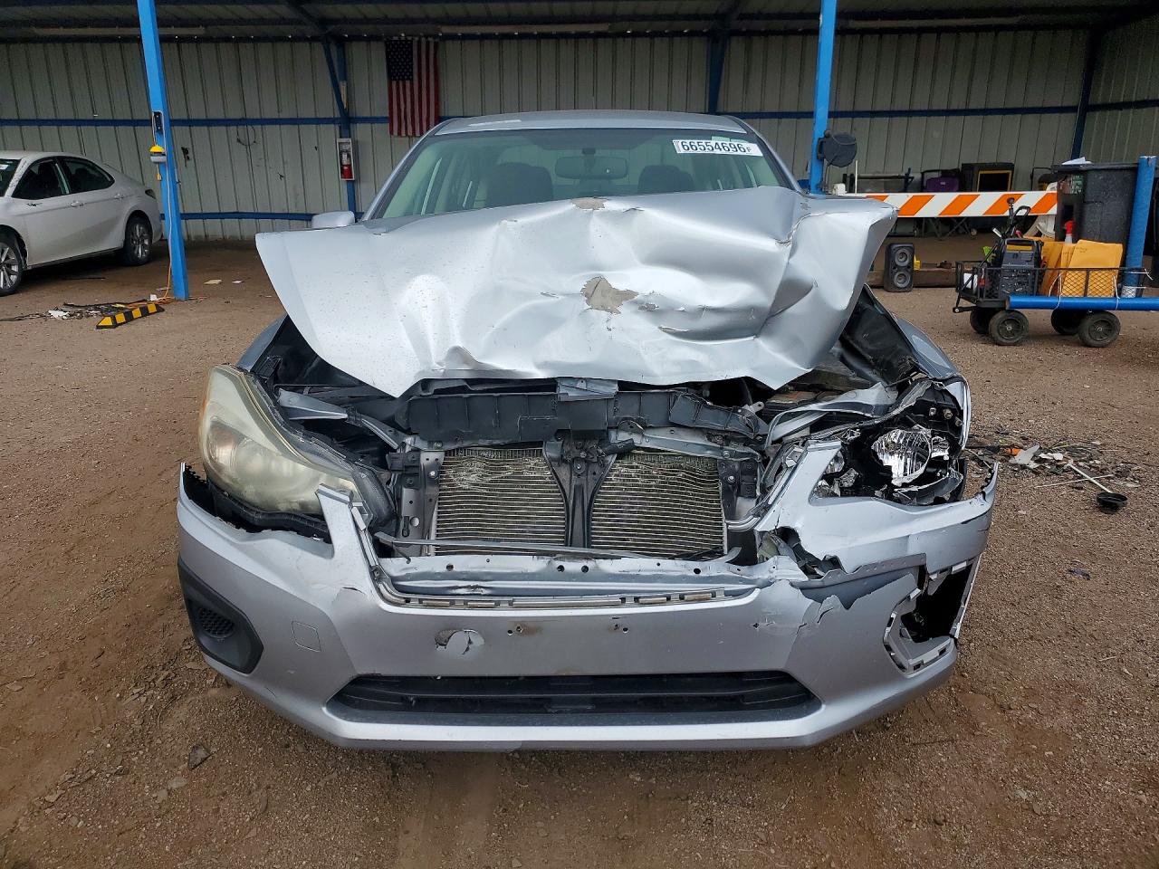 JF1GJAC64DH032075 · 2013 SUBARU IMPREZA · 5/12