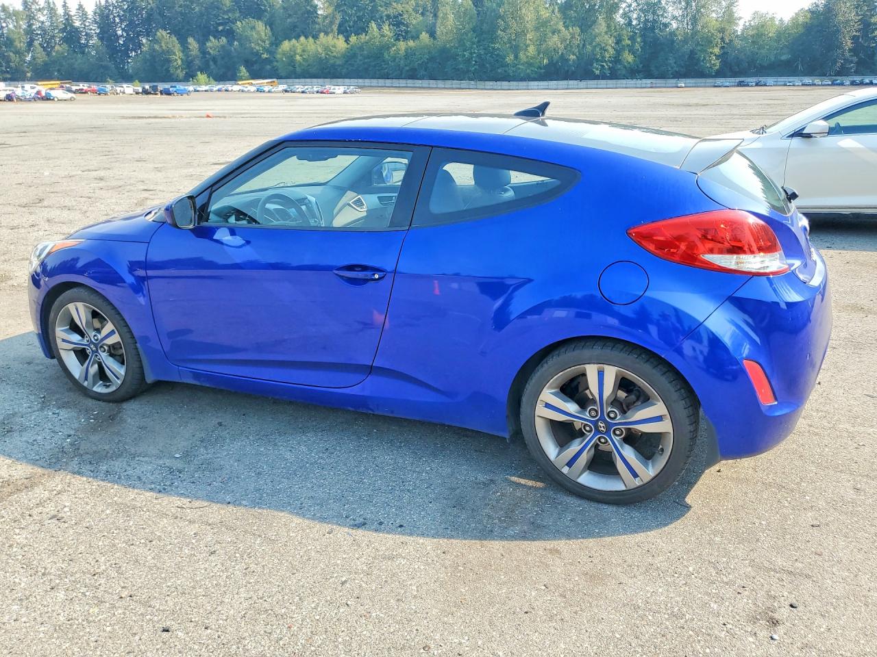 KMHTC6AD2CU046981 · 2012 HYUNDAI VELOSTER · 2/13